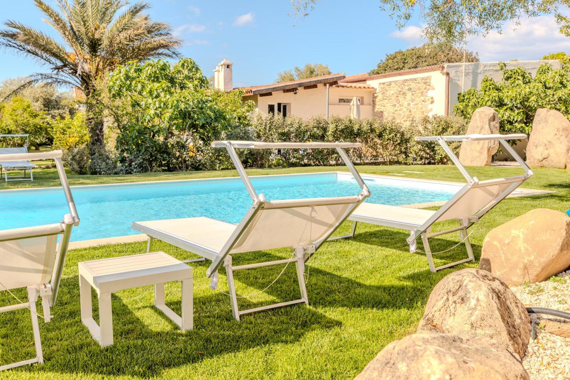 Апартаменти Stazzo San Teodoro La Quercia Piscina Condivisa Екстер'єр фото